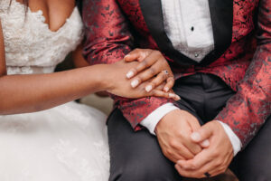 Couple holding hands at their Predator Ridge Wedding