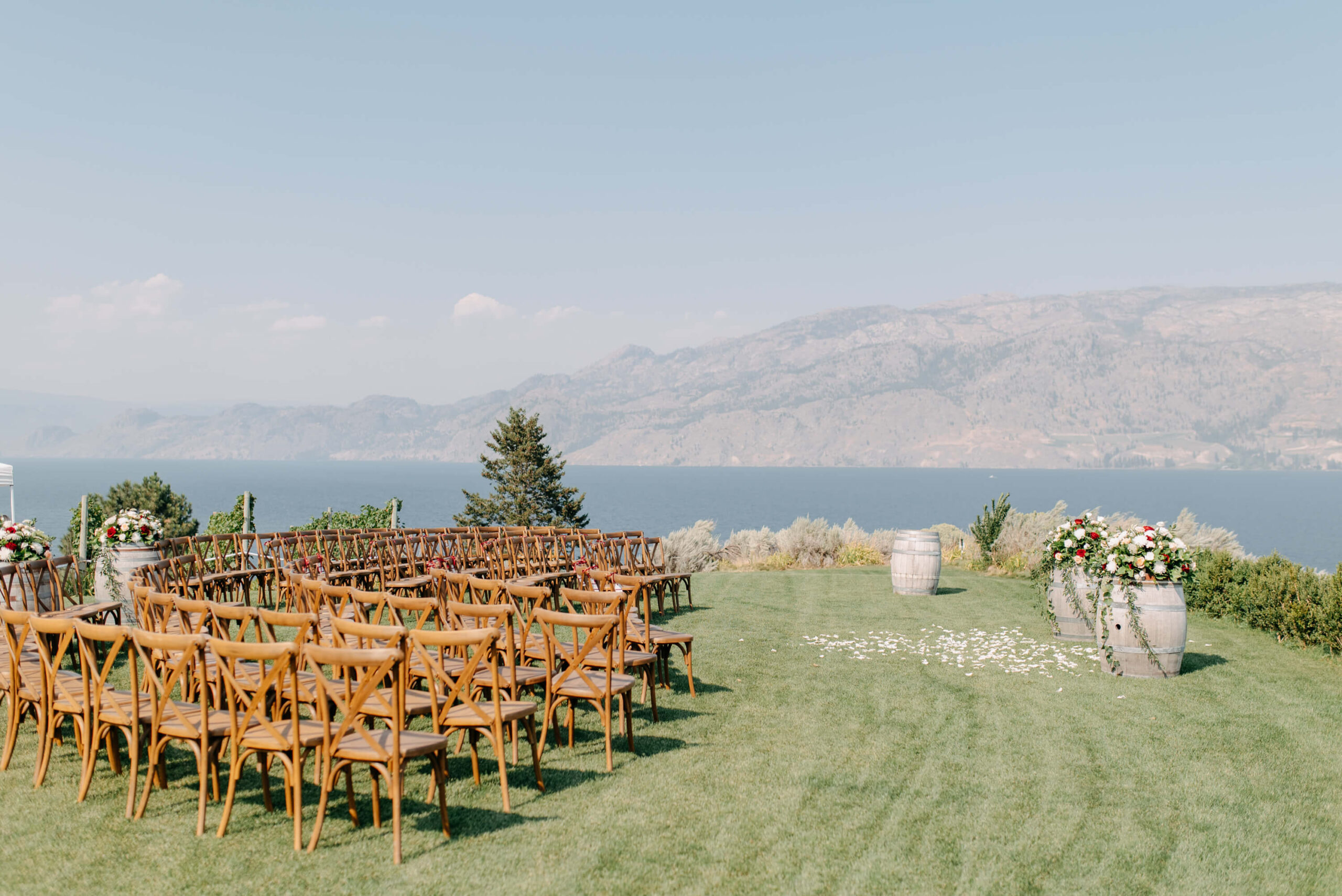 kelowna wedding venue featuring a vineyard and lakeview with mountain views