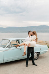 couple in front of car
